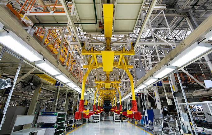 Industrial AI for manufacturing India showing automated production line with predictive analytics dashboard